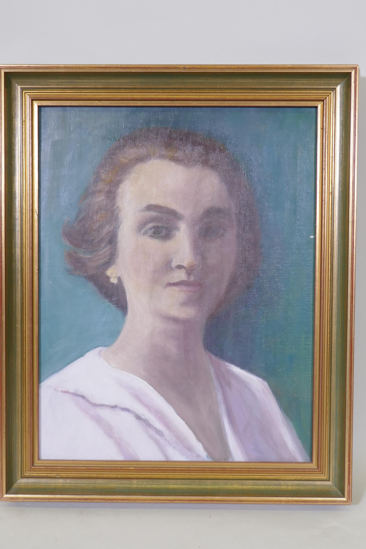 Portrait of a woman, mid C20th, oil on canvas board, unsigned, 34 x 45cm - Image 2 of 3