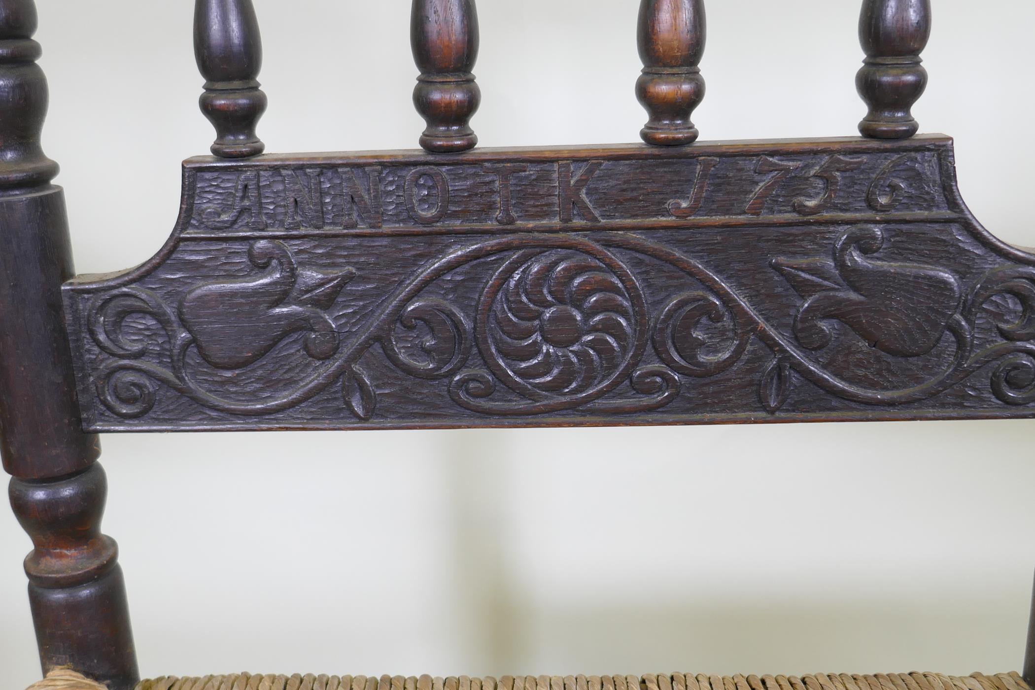 An C18th continental oak side chair, the back carved with a leaping stag and inscribed ANNO TK 1756, - Image 5 of 8