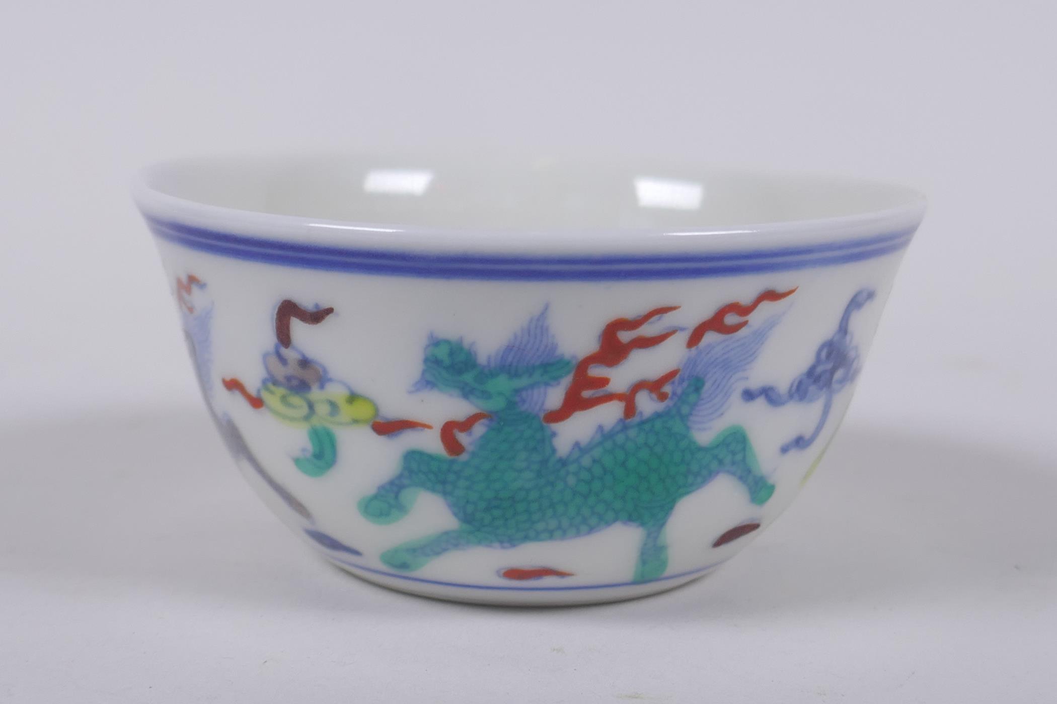 A doucai porcelain tea bowl with kylin decoration, Chinese Chenghua 6 character mark to base, 8cm