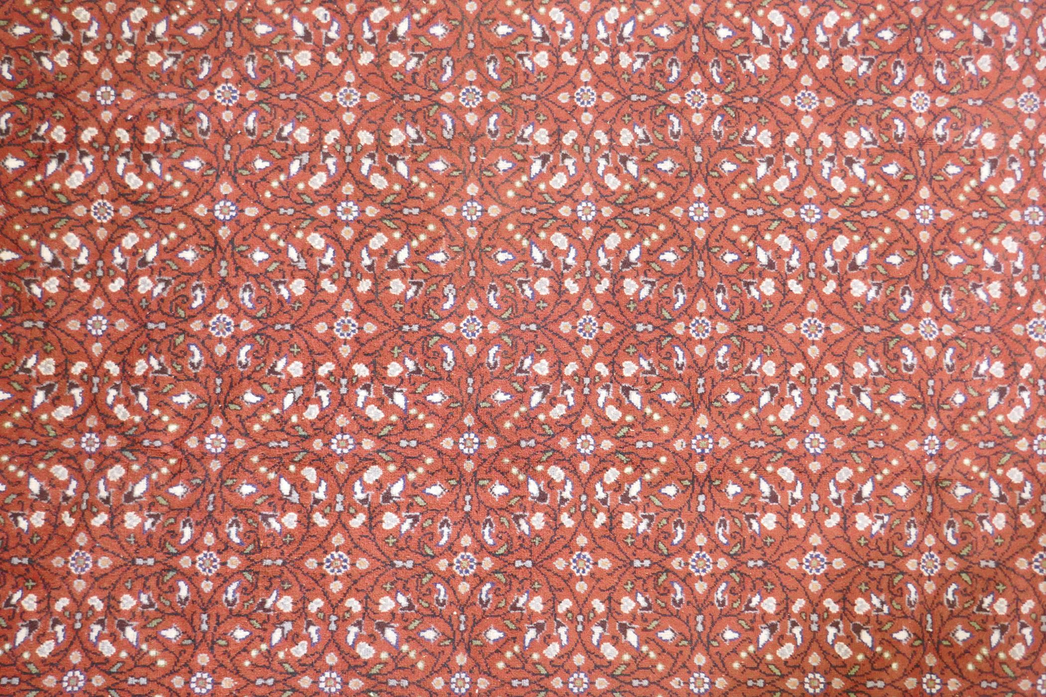 A terracotta ground wool pile Turkish Erikeh rug with all over design,200 x 290cm - Image 2 of 6