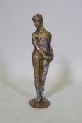 A gilt bronze figure of a female nude, after the antique, 25cm high