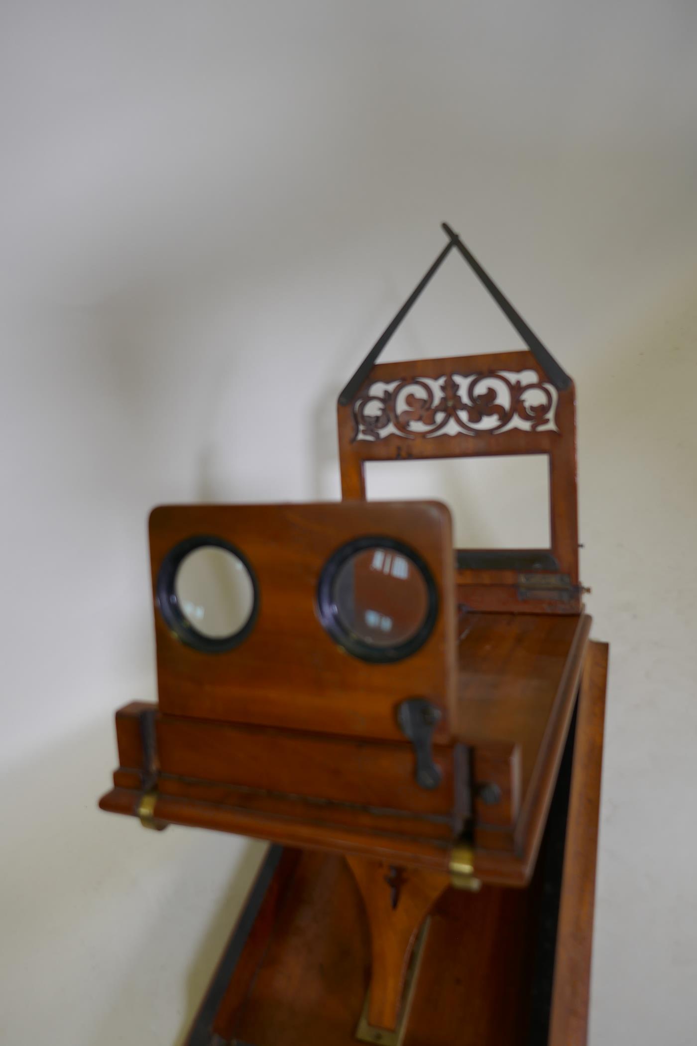 A good C19th mahogany stereoscope with pierced fret decoration, in the manner of Newton & Co, 39 x - Image 2 of 5