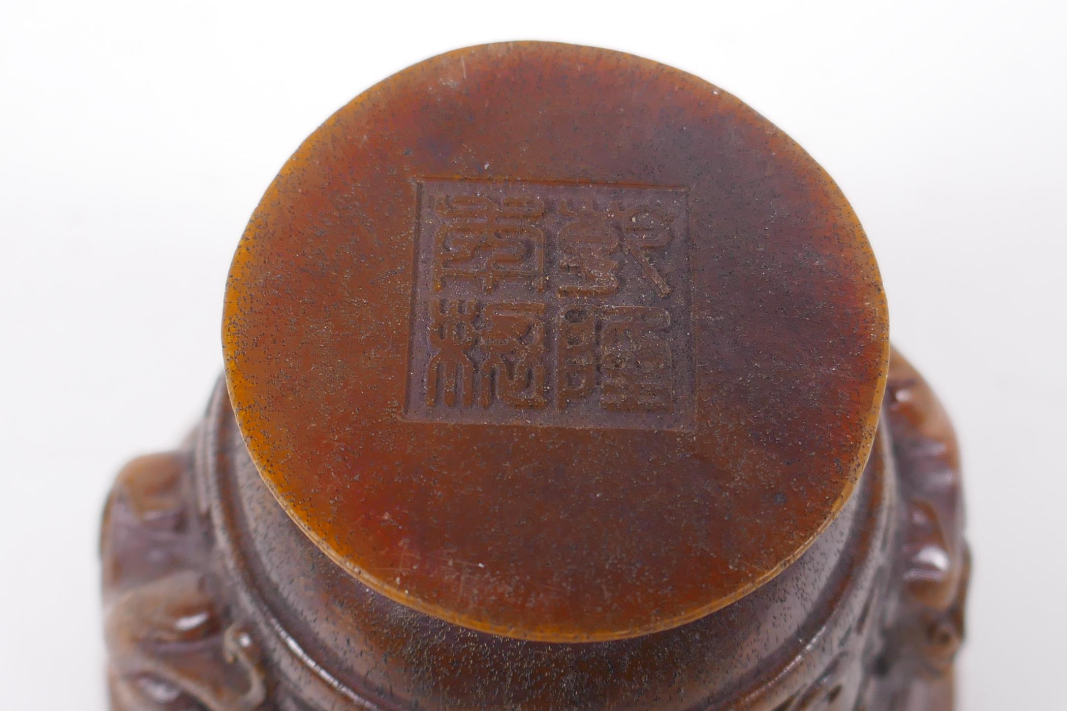 A Chinese faux horn libation cup with raised kylin decoration, seal mark to base, 8cm high x 10cm - Image 6 of 6