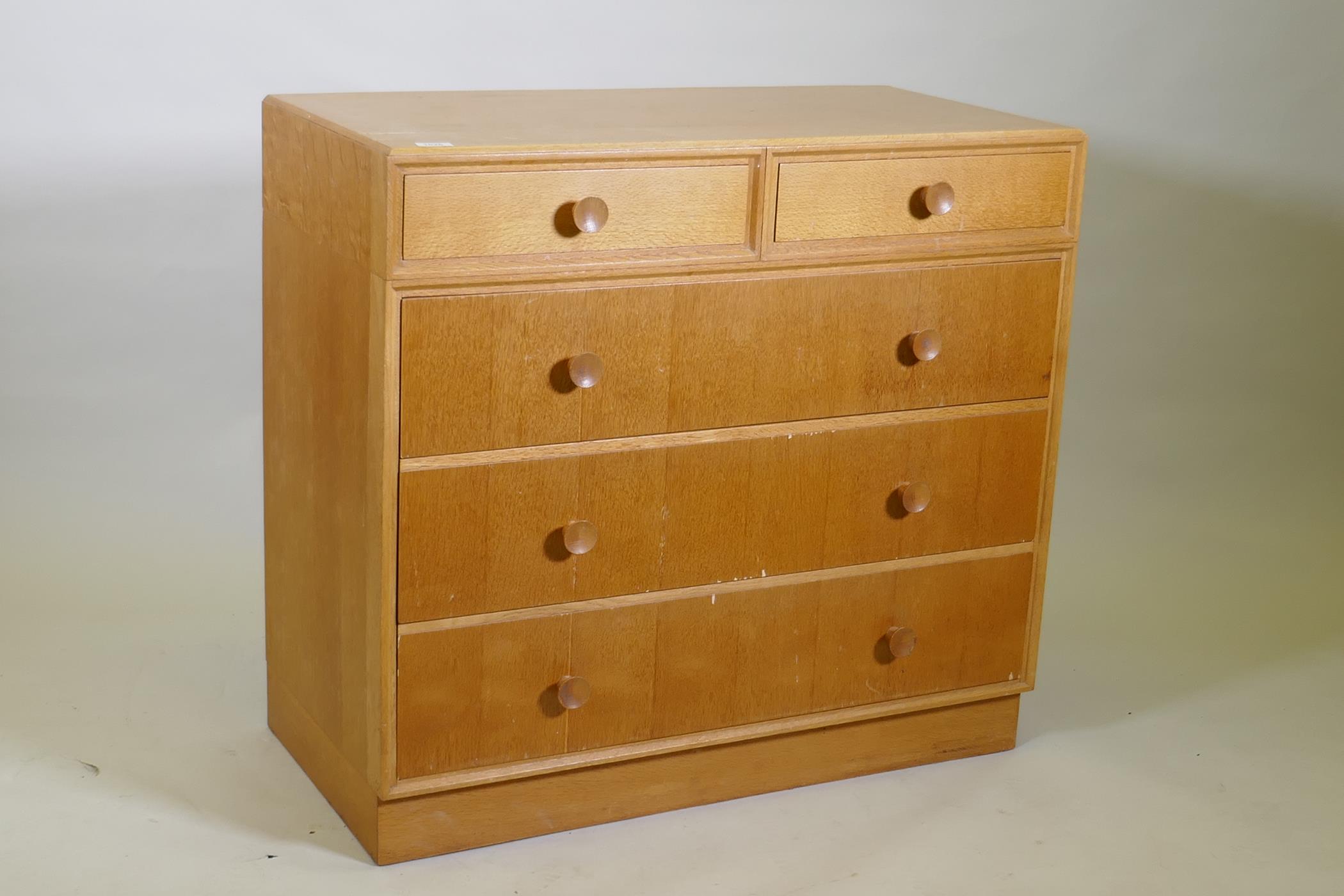 A mid century Meredew oak veneered chest of two over three drawers, raised on a plinth base, AF some - Image 2 of 6