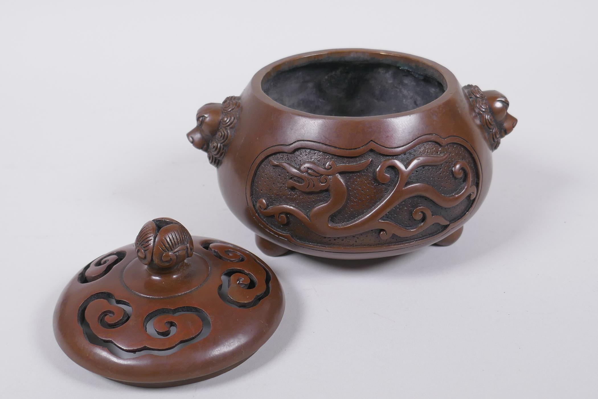 A Chinese bronze censer and cover with two lion mask handles and stylised decorative dragon - Image 4 of 6