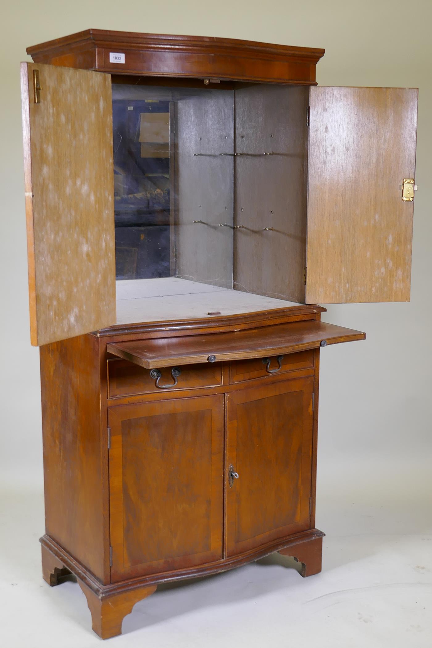 A serpentine front yew wood cocktail cabinet, with two cupboards and mirror back interior, - Image 3 of 3