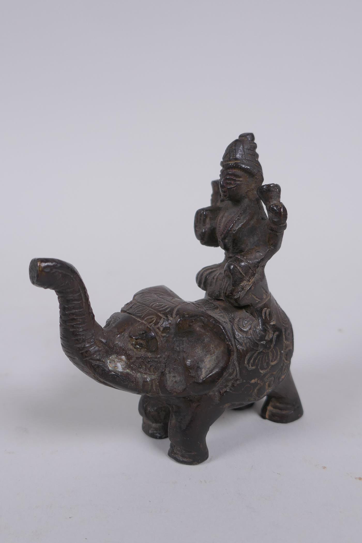 An Indian bronze figure of ganesh, and another Indian bronze figure of a deity riding an elephant, - Image 5 of 6