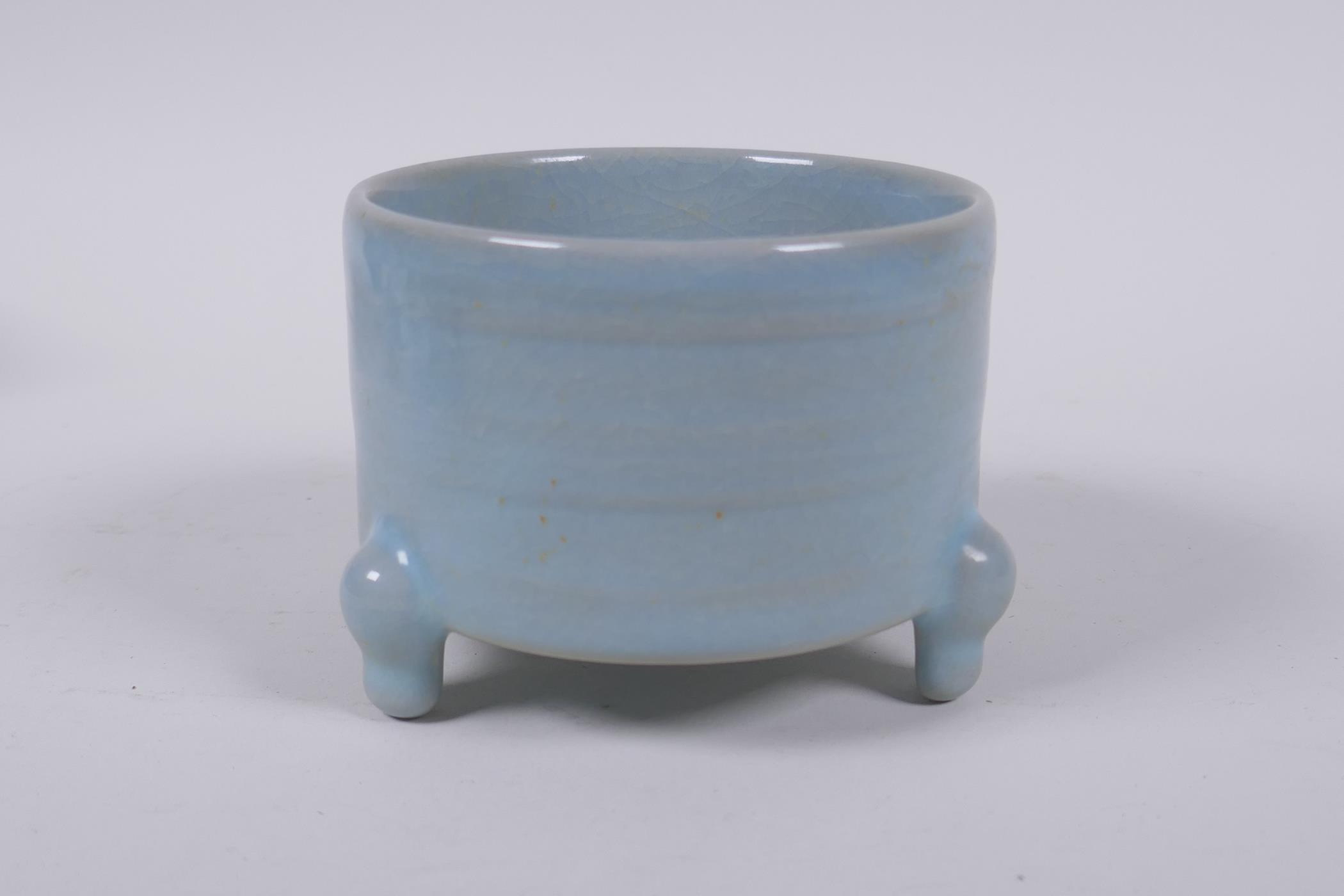 A Chinese Ru ware style porcelain cylinder censer on tripod supports, 10cm diameter - Image 2 of 3