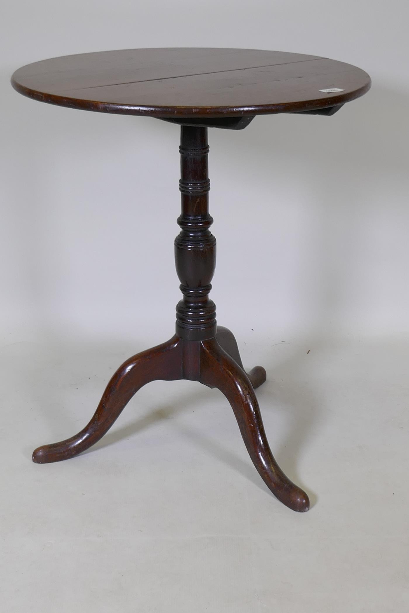 A Georgian tilt top oak table, raised on a canon barrel turned column with tripod supports, adapted, - Image 2 of 5