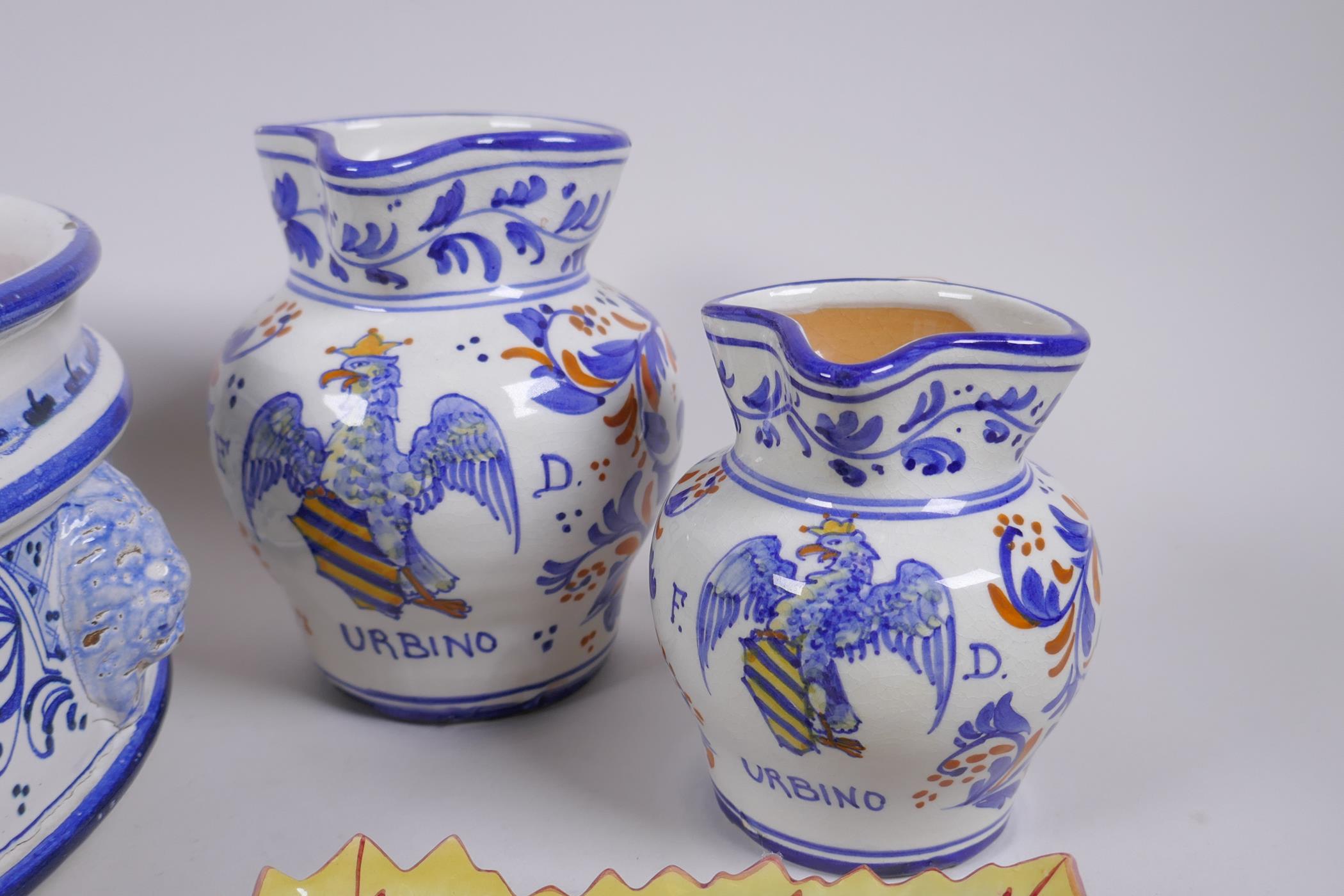 A collection of Italian majolica to include a bramble wine jug, leaf, shape dishes, a steep sided - Image 5 of 8