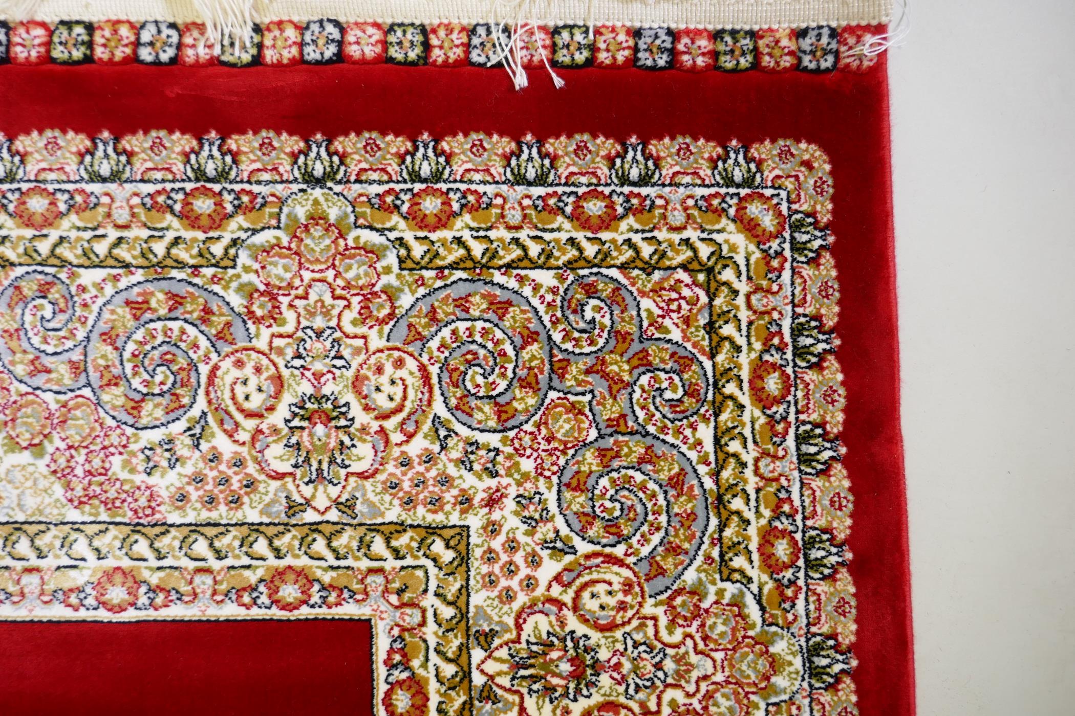 A rich ruby red ground full pile Qum rug with floral medallion pattern, 158 x 234cm - Image 4 of 7