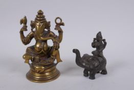 An Indian bronze figure of ganesh, and another Indian bronze figure of a deity riding an elephant,