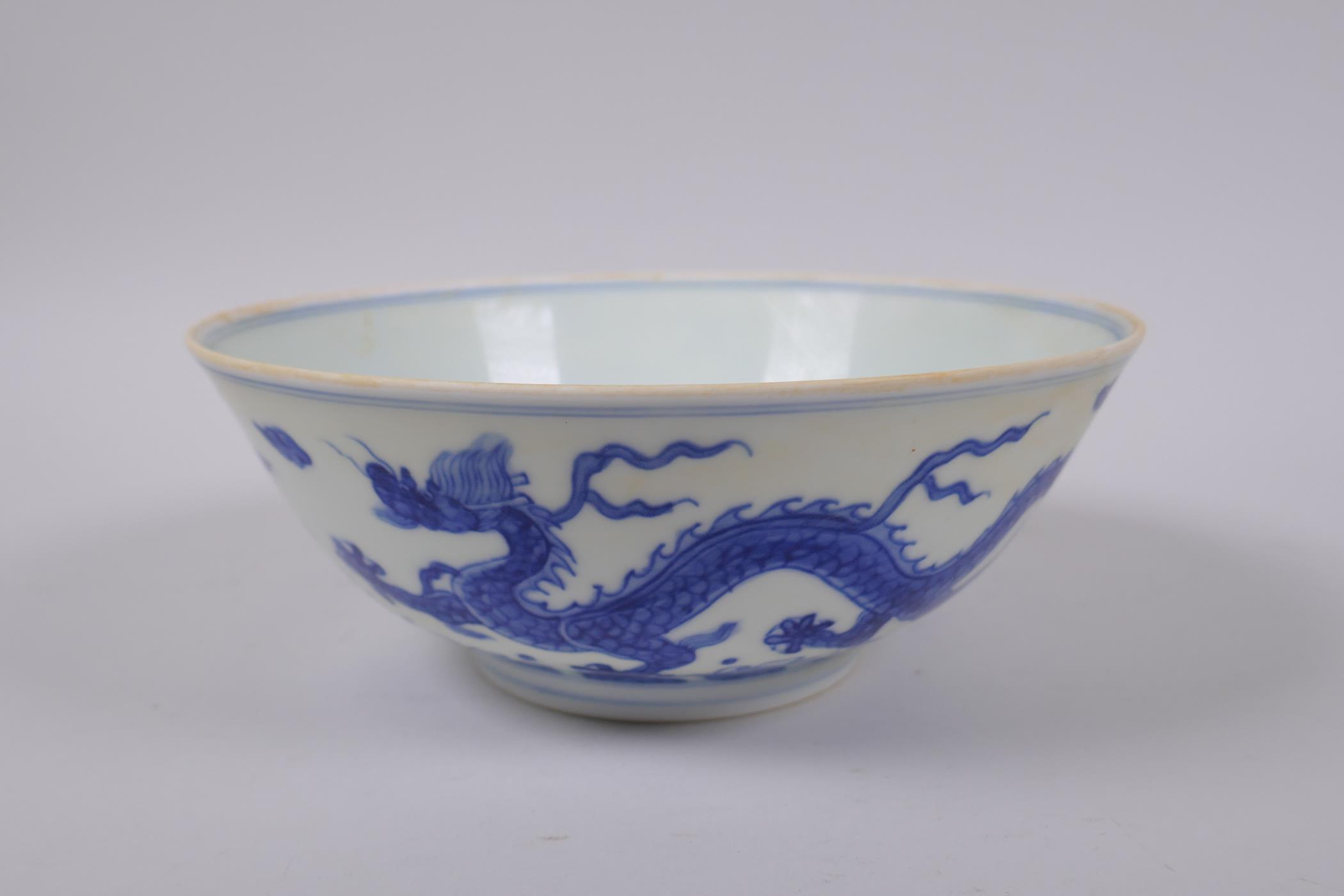 A Chinese blue and white porcelain bowl with dragon decoration, Chenghua 6 character mark to base, - Image 3 of 5