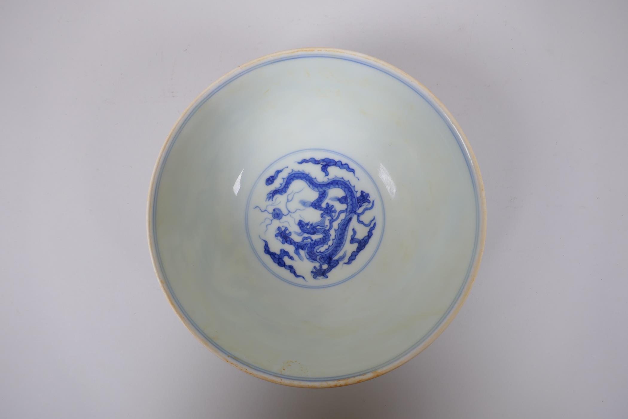 A Chinese blue and white porcelain bowl with dragon decoration, Chenghua 6 character mark to base, - Image 4 of 5