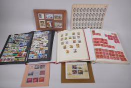 A quantity of early C20th Cinderella stamps, an album of C19th and C20th USA stamps and postage