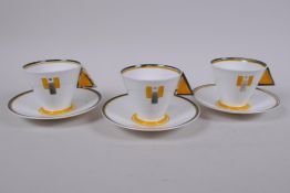 Three 1930 Shelley Art Deco 'Vogue' shaped cup and saucers in the Yellow Blocks pattern, designed by