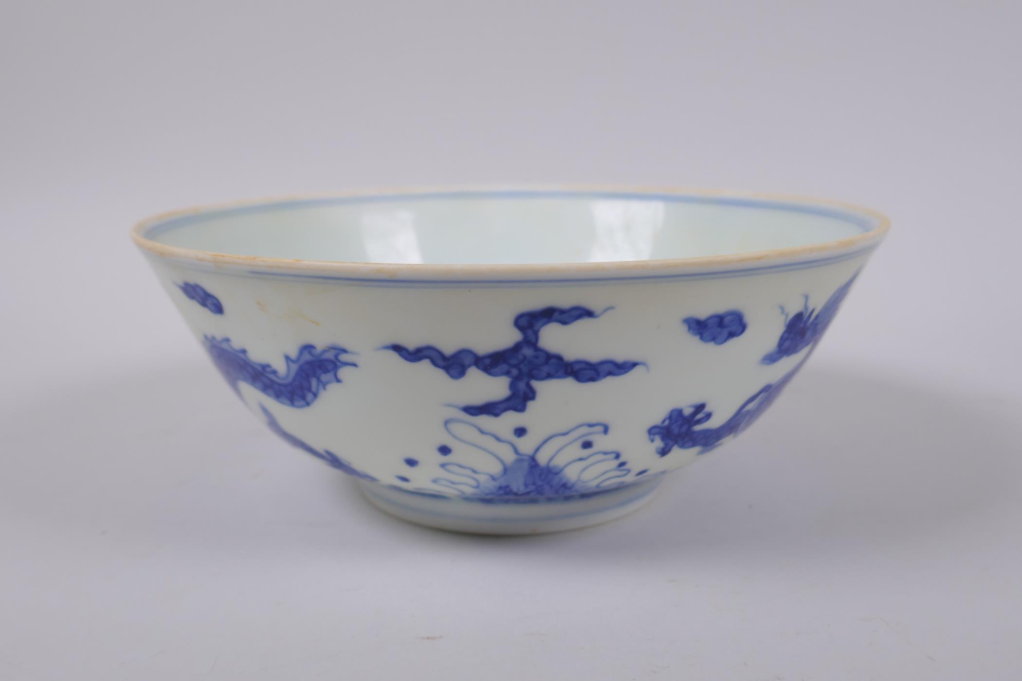 A Chinese blue and white porcelain bowl with dragon decoration, Chenghua 6 character mark to base, - Image 2 of 5