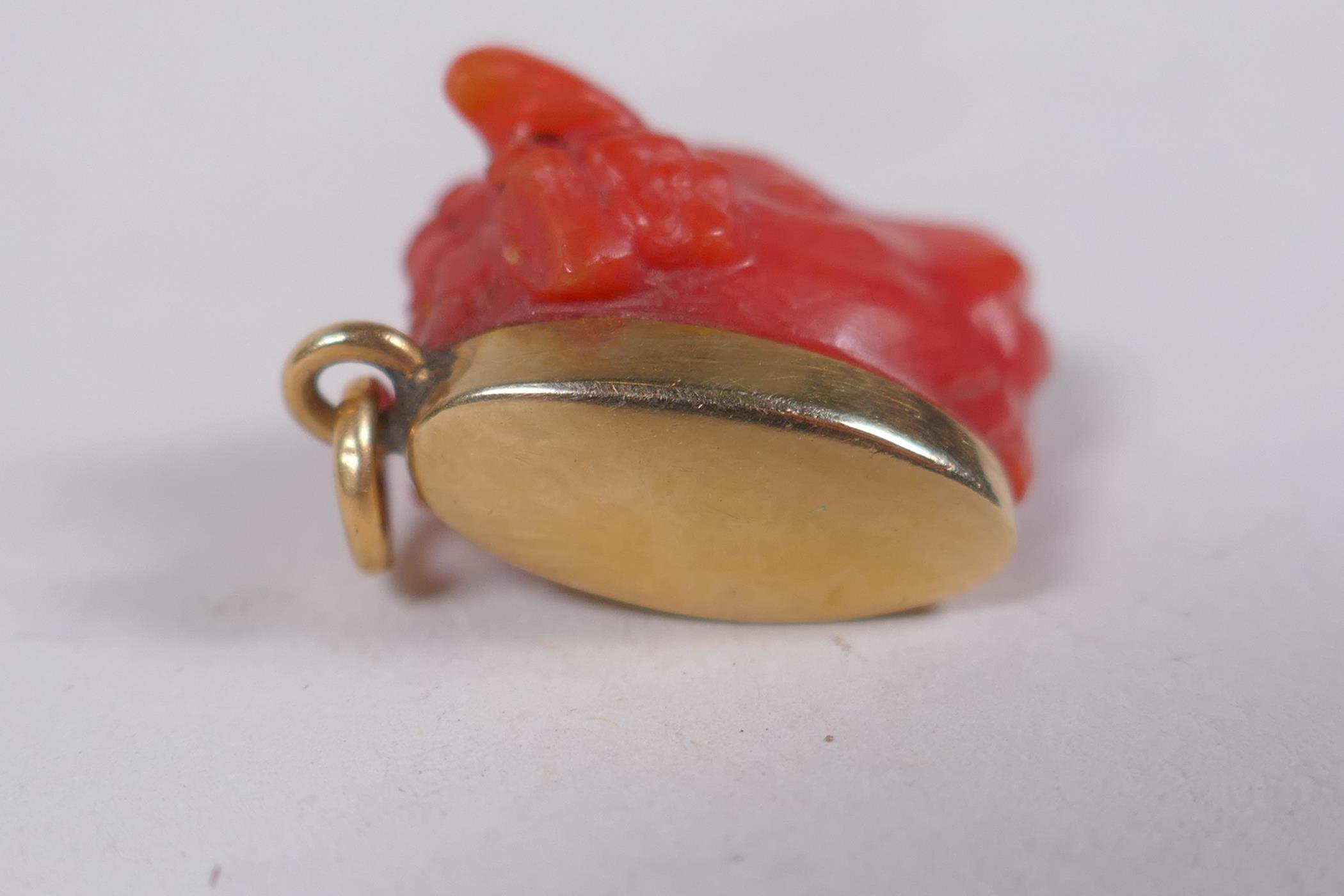 A coral pendant with silver mount set with a n amethyst and white stones, 3cm long, a coral pig with - Image 5 of 6