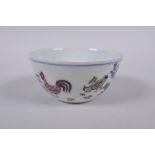 A Doucai porcelain tea bowl with chicken decoration, Chinese Chenghua 6 character mark to base,