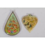 A vintage Indian mother of pearl pendant with miniature painted decoration of exotic birds and