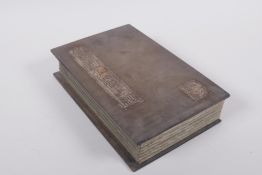 A Chinese wood and silk bound book containing amber hardstone tablets with chased and gilt character