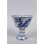 A Chinese blue and white porcelain stem cup with dragon decoration, Xuande 6 character mark to base,