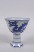 A Chinese blue and white porcelain stem cup with dragon decoration, Xuande 6 character mark to base,