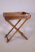 A rustic style butler's tray and stand, with Brighton Pier decoration, 44 x 65cm