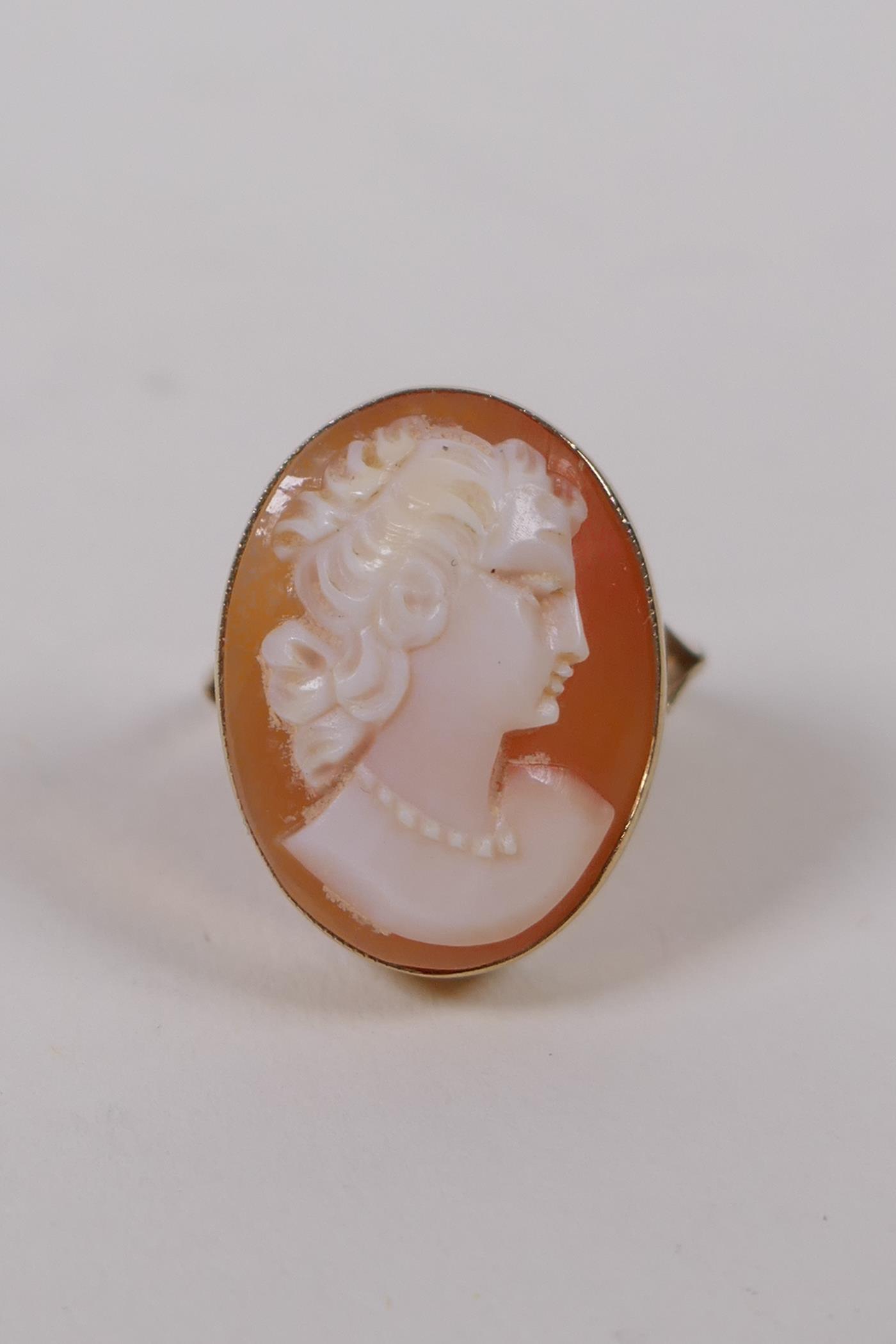 A 9ct gold dress ring, set with a cameo, Birmingham 1976, size N, gross weight 4.2g, with valuer's - Image 2 of 4