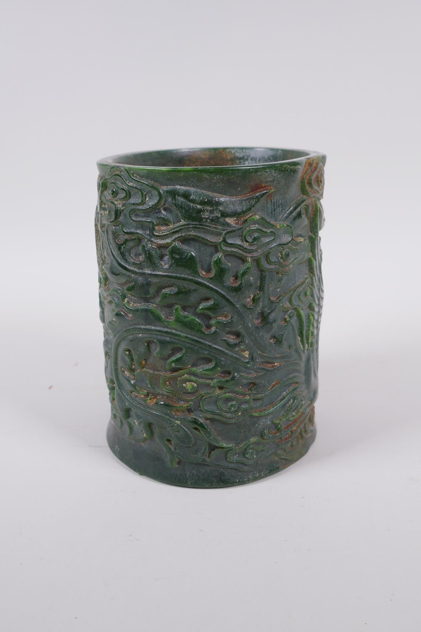 A Chinese carved green hardstone brush pot decorated with a dragon and phoenix, Qianlong seal mark - Image 3 of 6
