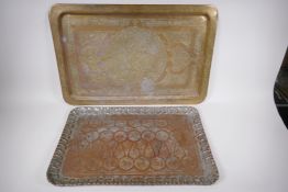An Islamic brass tray with engraved decoration and a plated copper tray with engraved animal