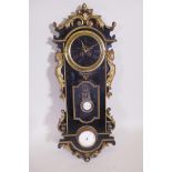 An antique ormolu and ebonised wood cased wall clock and barometer, the spring driven movement