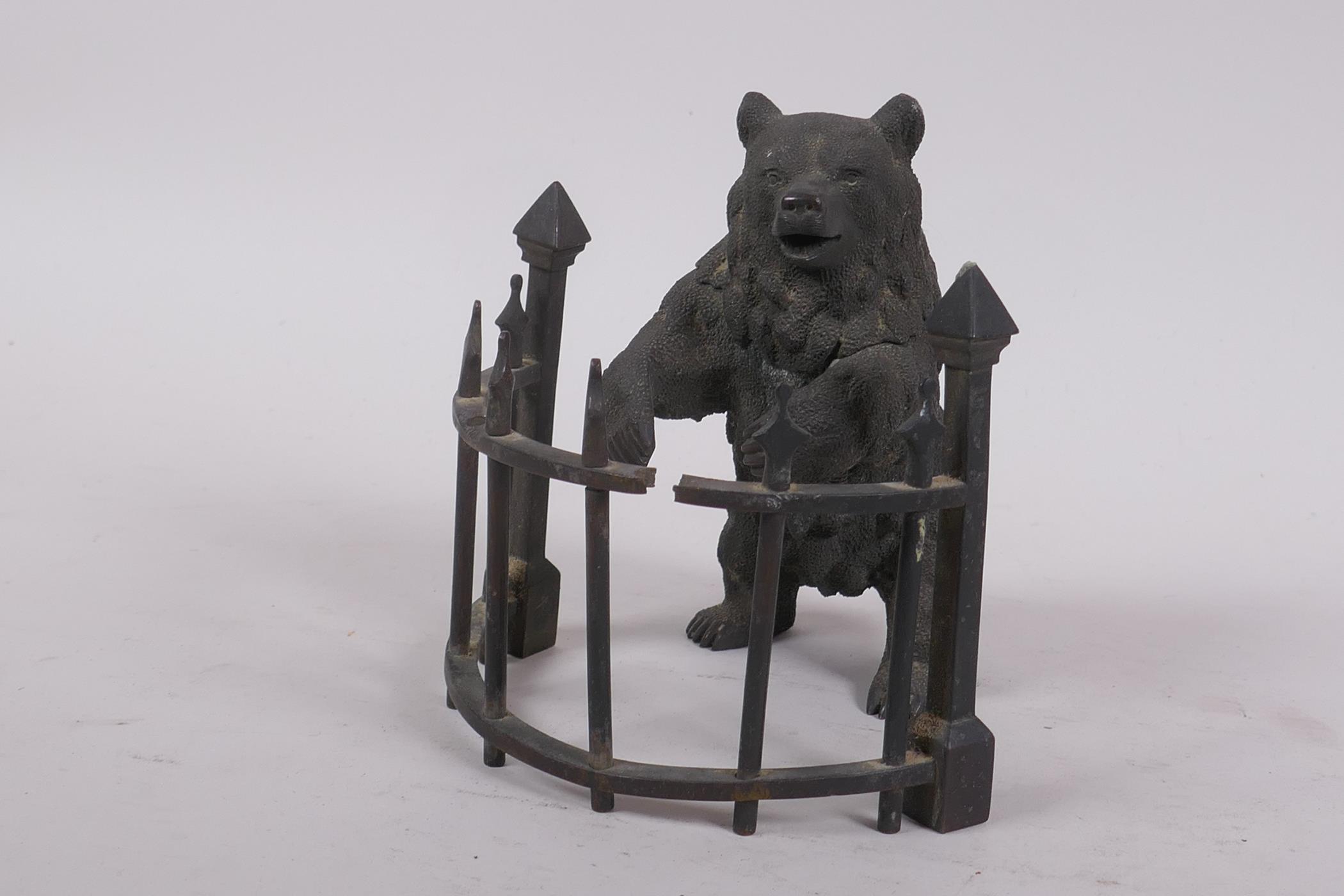 A C19th finely cast patinated bronze inkwell in the form of a bear behind railings, 12cm high - Image 7 of 7