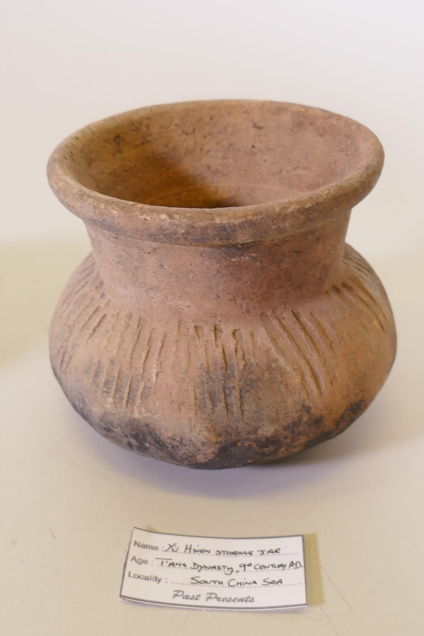 A Chinese Tang dynasty terracotta pot, labelled Hu Xian storage jar, another jar, Longshan, labelled - Image 4 of 8