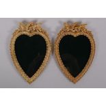 A pair of ormolu heart shaped photograph frames, 13 x 19cm