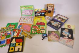 Early C20th block puzzle, a Codec ranch phone money box, jigsaws etc from the 1970s, Disney tin