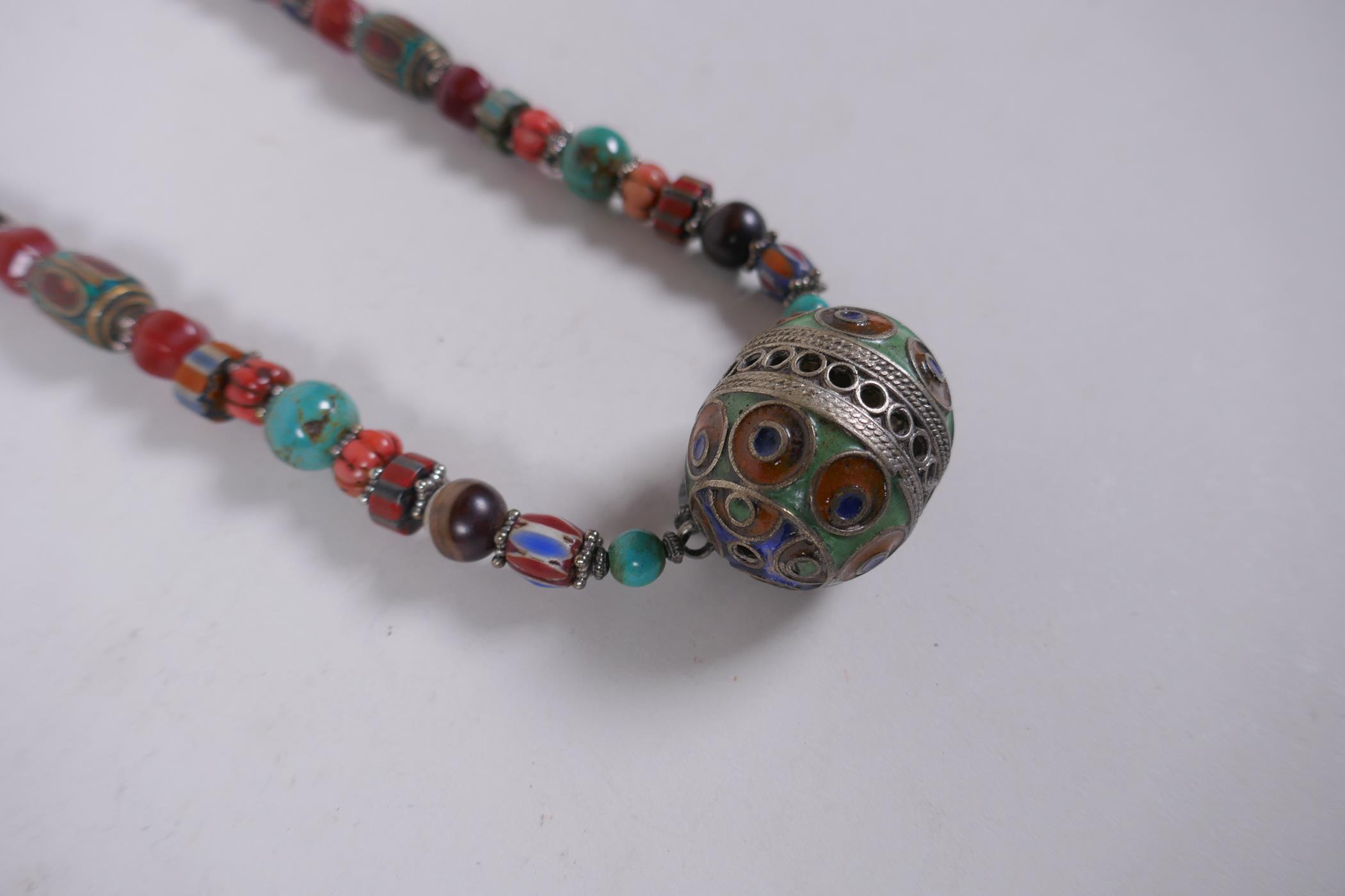 An oriental enamelled white metal, agate, coral, turquoise and multicolour glass bead necklace, 62cm - Image 2 of 4