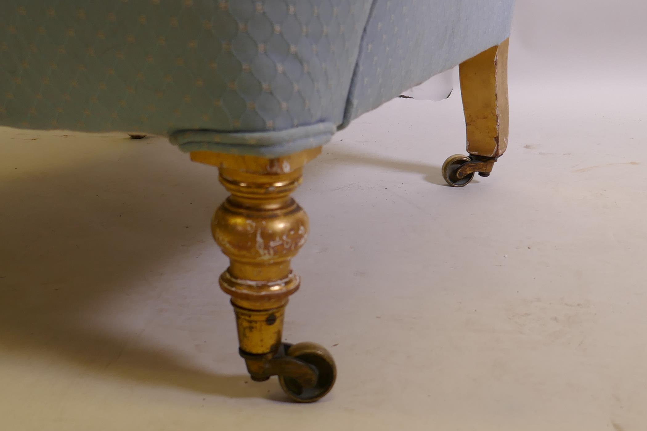 A C19th humpback nursing chair, on turned water gilt supports and brass castors - Image 2 of 3