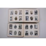 Two late C19th/early C20th Ogden's photo albums complete with Ogden's Guinea Gold cigarette cards