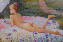 Study of a young woman sun bathing in a garden, signed in cyrillic (?) verso, oil on canvas, 30 x