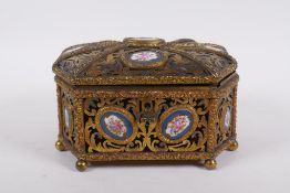 A C19th French pierced ormolu jewellery casket with inset Sevres porcelain floral plaques and