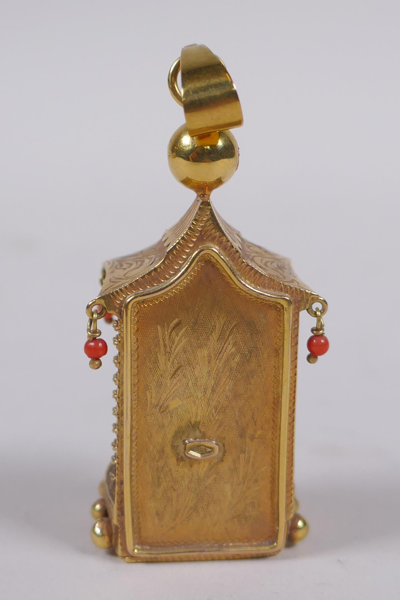 A 9ct gold pendant in the form of a shrine with carved coral figure of Buddha, 22.2g gross - Image 4 of 6