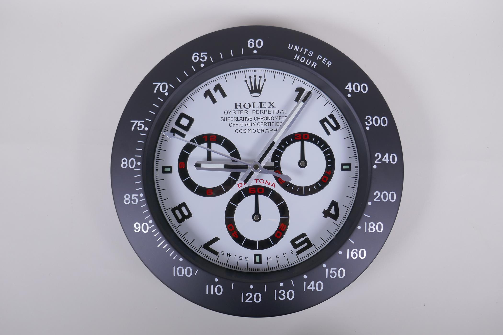 A Rolex Daytona style wall clock, 34cm diameter