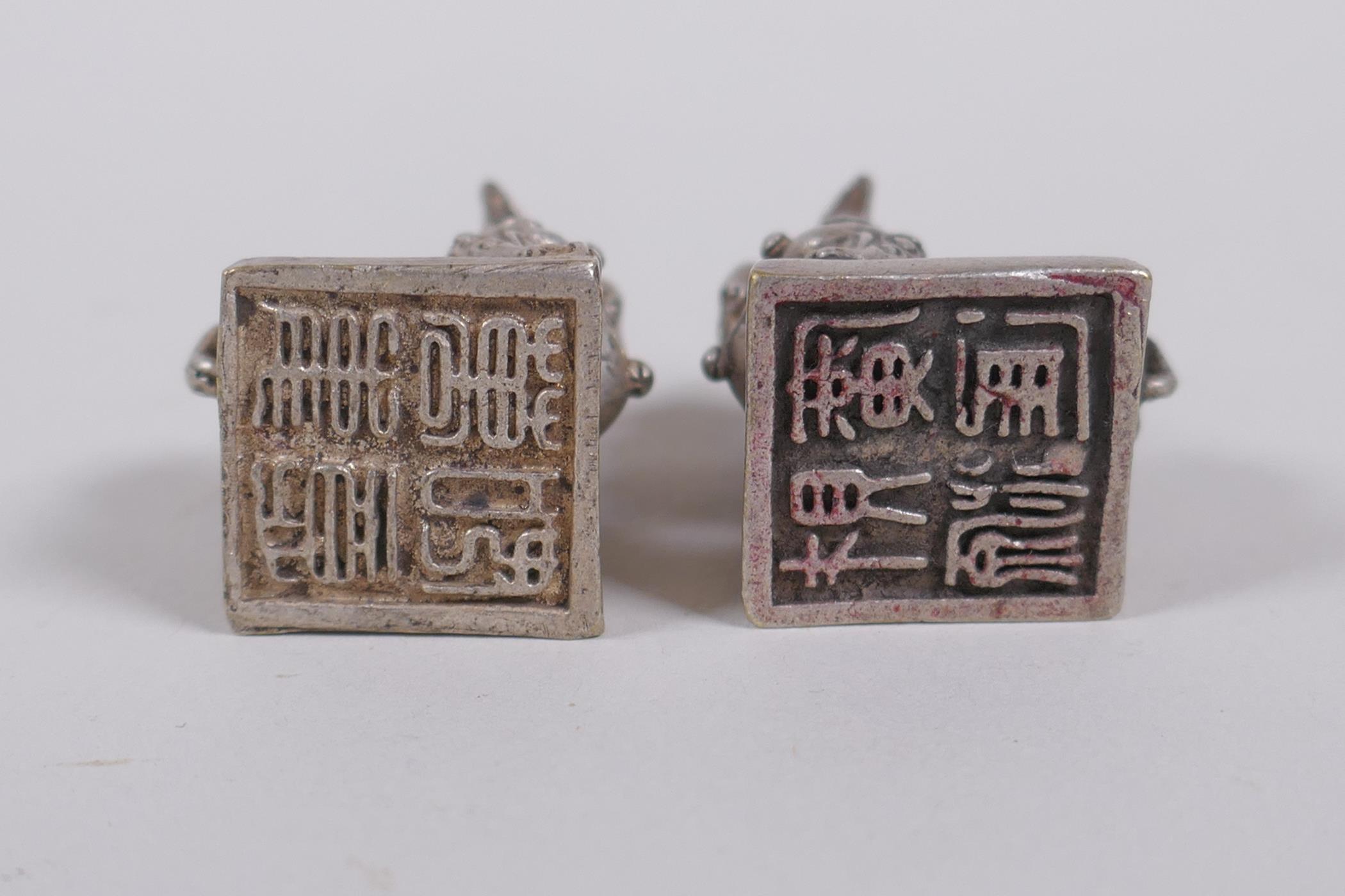 A pair of Chinese white metal seals with Fo dog knops, 3cm high - Image 3 of 3