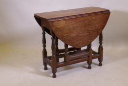 A C19th oak gateleg table with a single drawer, 76 x 34cm, 62cm high, 76 x 96cm extended