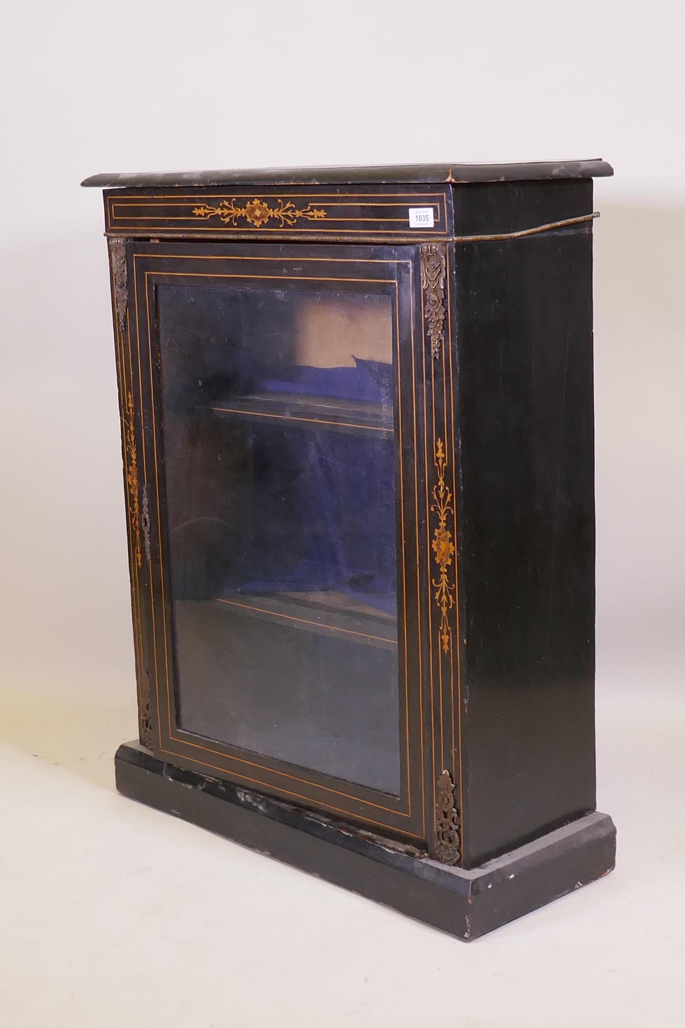 A Victorian ebonised and inlaid pier cabinet with brass mounts and single glazed door, raised on a - Image 2 of 4