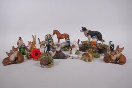 A collection of Border Fine Arts figures, birds and woodland animals