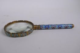 An antique continental brass and cloisonne magnifying glass, 22cm long