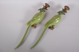 A pair of polychrome porcelain parrot candle sconces with gilt metal mounts, 48cm