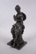 After Emile Bruchon, a late C19th/early C20th French bronze of a seated woman holding a nest of